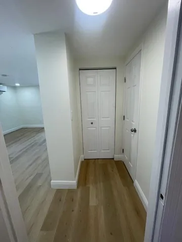 a view of an empty room and window