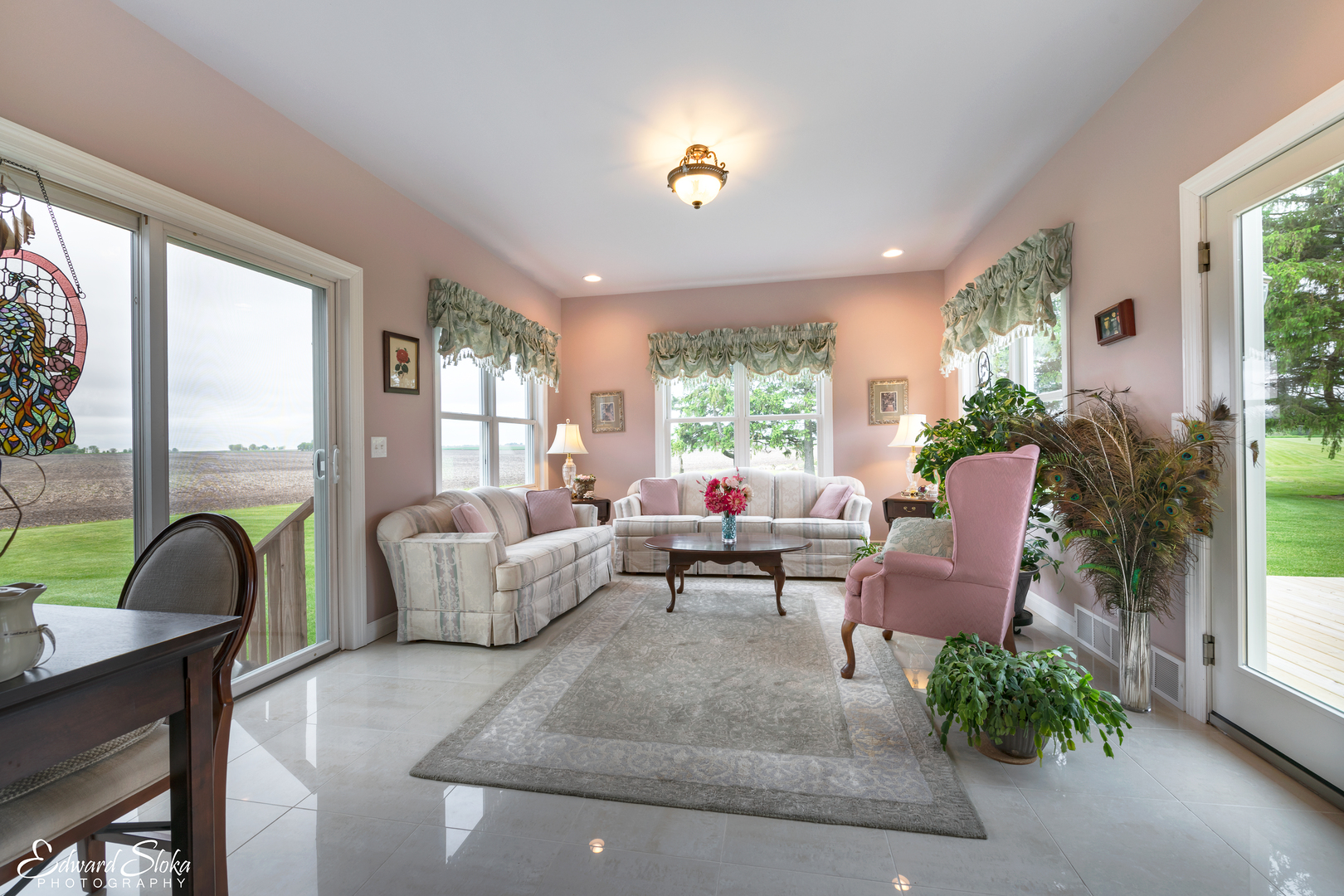 1246 Pinegar Road Garden Prairie, IL 61038 - Photo 12 of 43 a living room with furniture and a large window