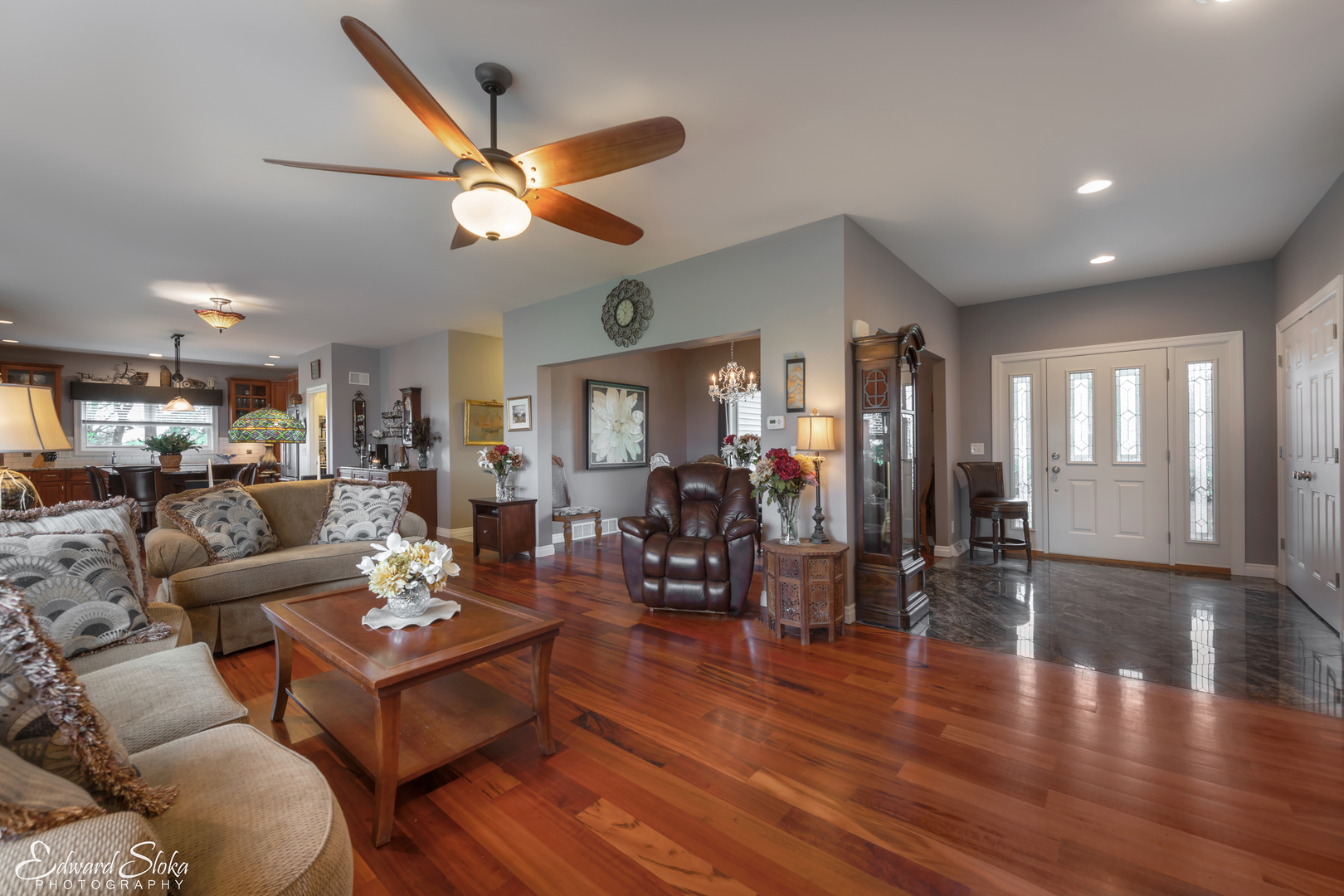 1246 Pinegar Road Garden Prairie, IL 61038 - Photo 17 of 43 a living room with furniture or wooden floor and a ceiling fan