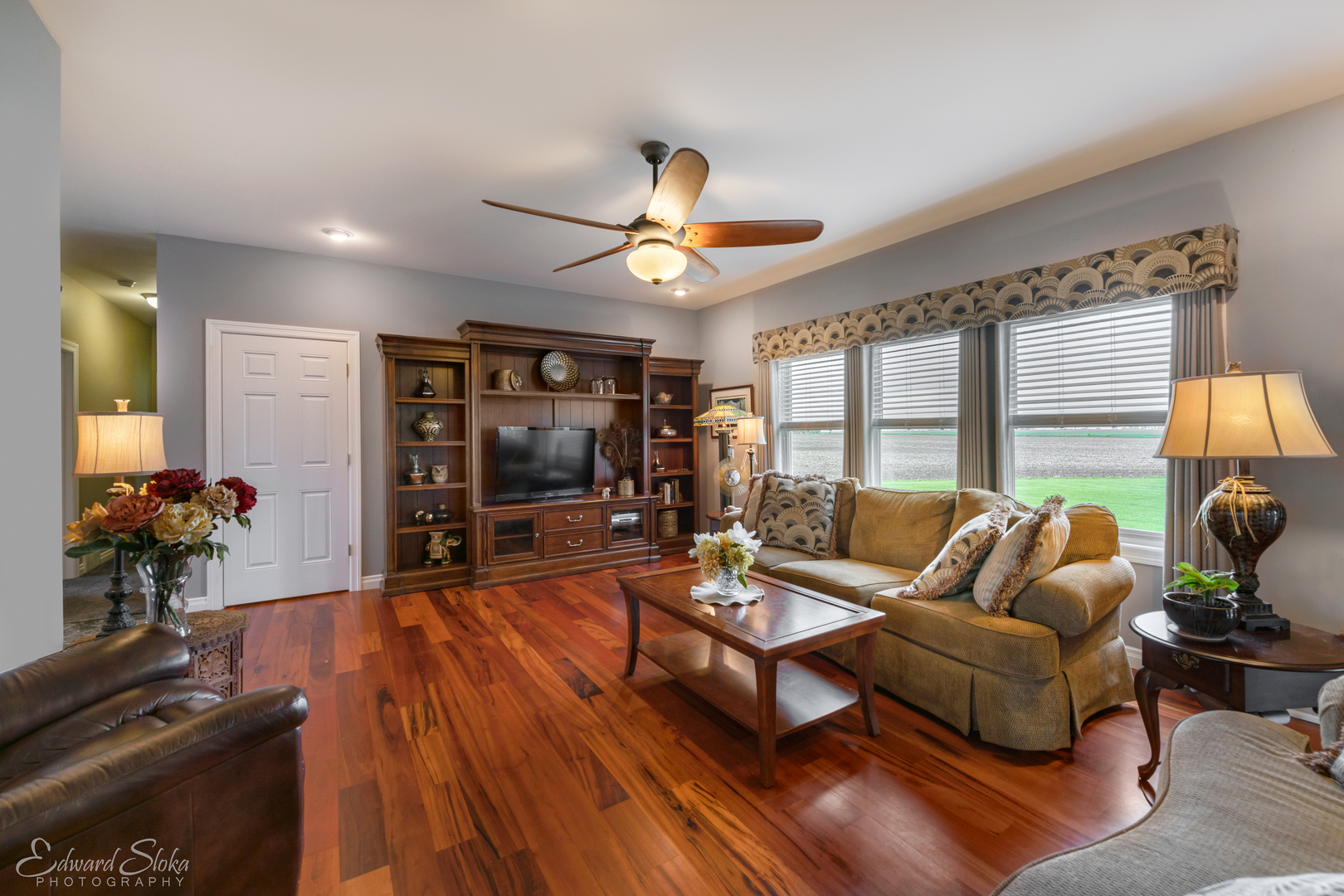 1246 Pinegar Road Garden Prairie, IL 61038 - Photo 18 of 43 a living room with furniture and a flat screen tv
