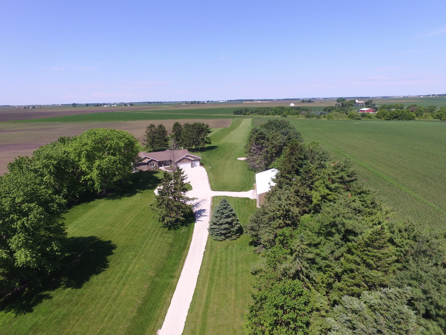 1246 Pinegar Road Garden Prairie, IL 61038 - Photo 3 of 43 a view of a lake with a yard