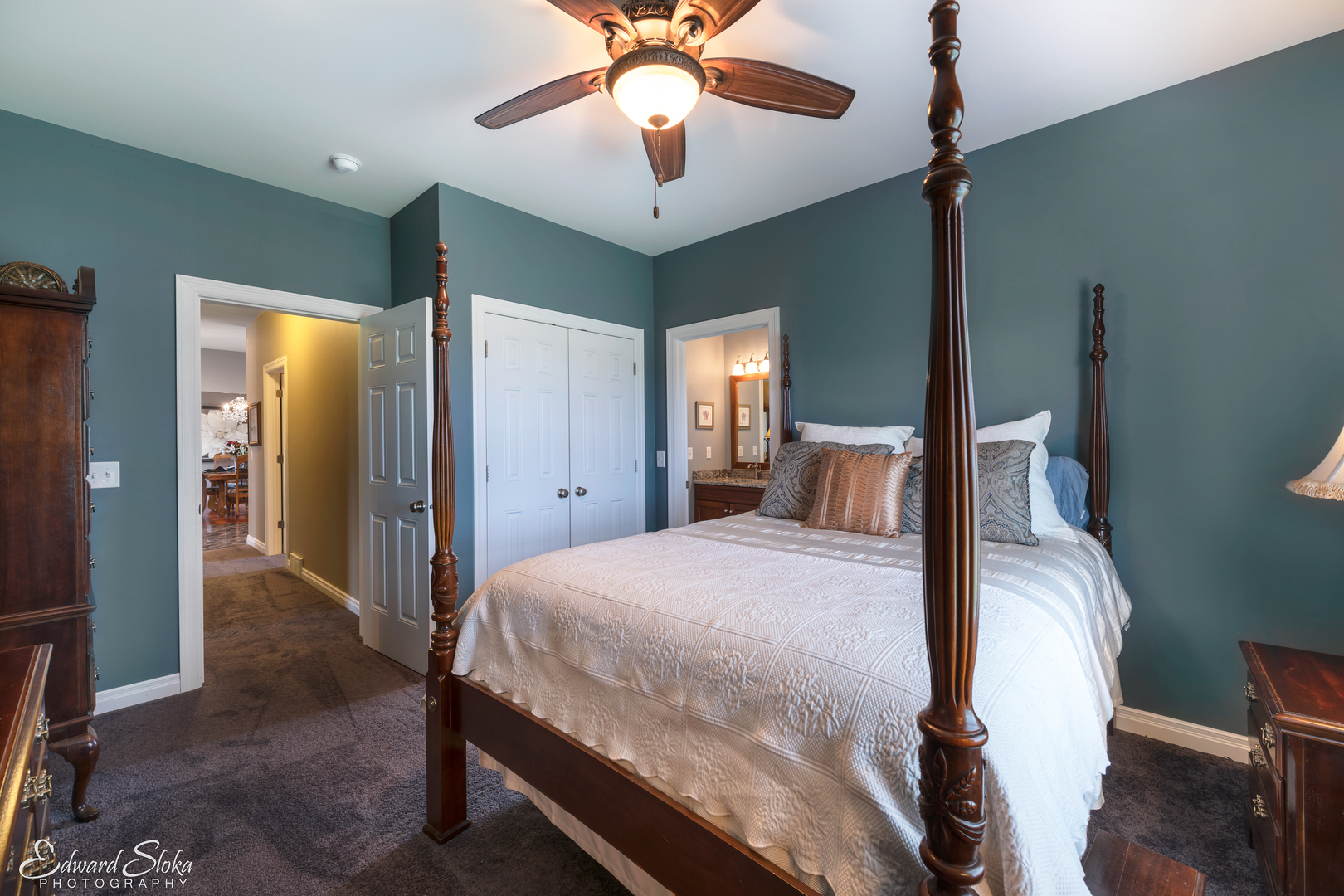1246 Pinegar Road Garden Prairie, IL 61038 - Photo 28 of 43 a bedroom with a bed and a chandelier