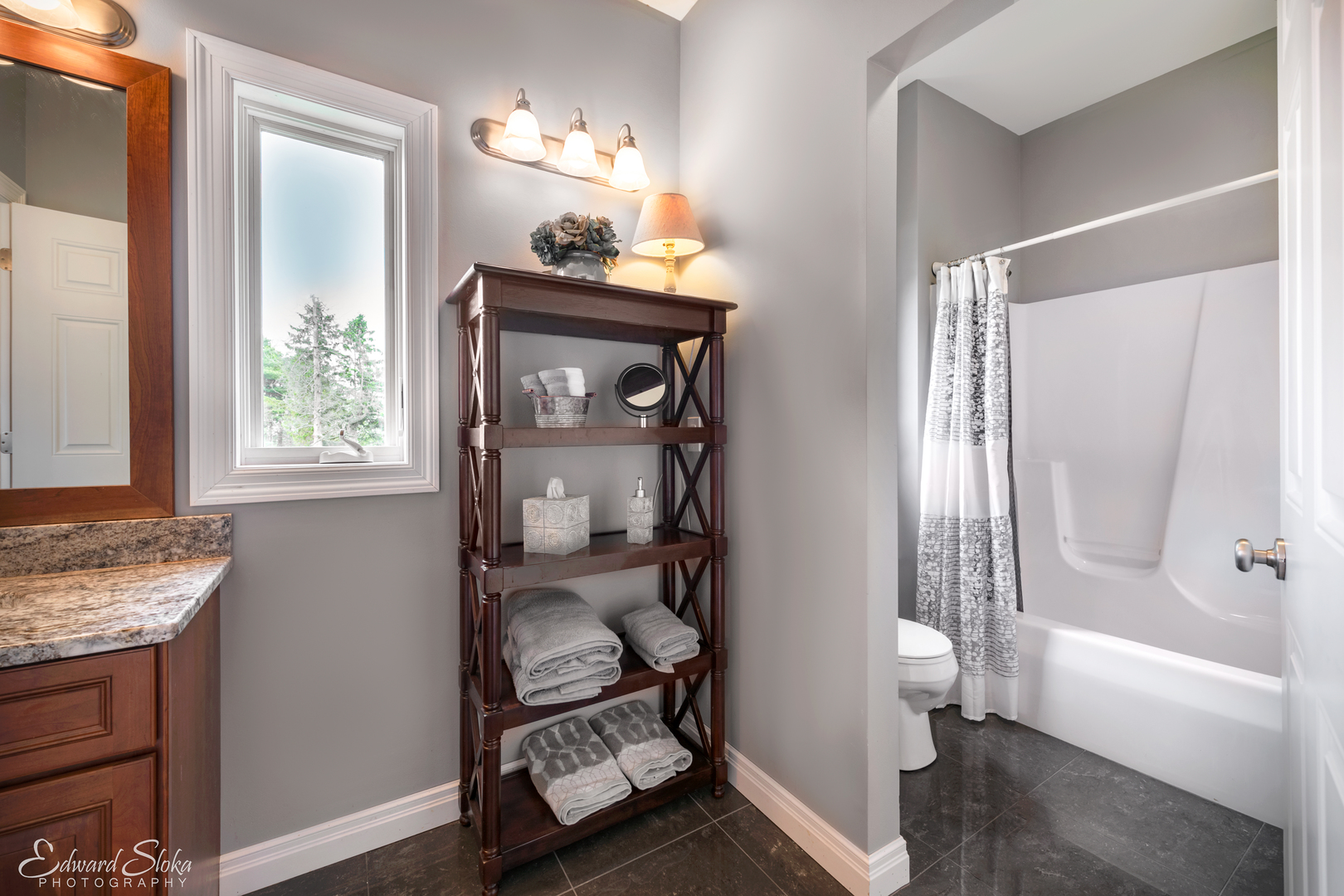 1246 Pinegar Road Garden Prairie, IL 61038 - Photo 31 of 43 a view of bathroom with a tub shower and mirror