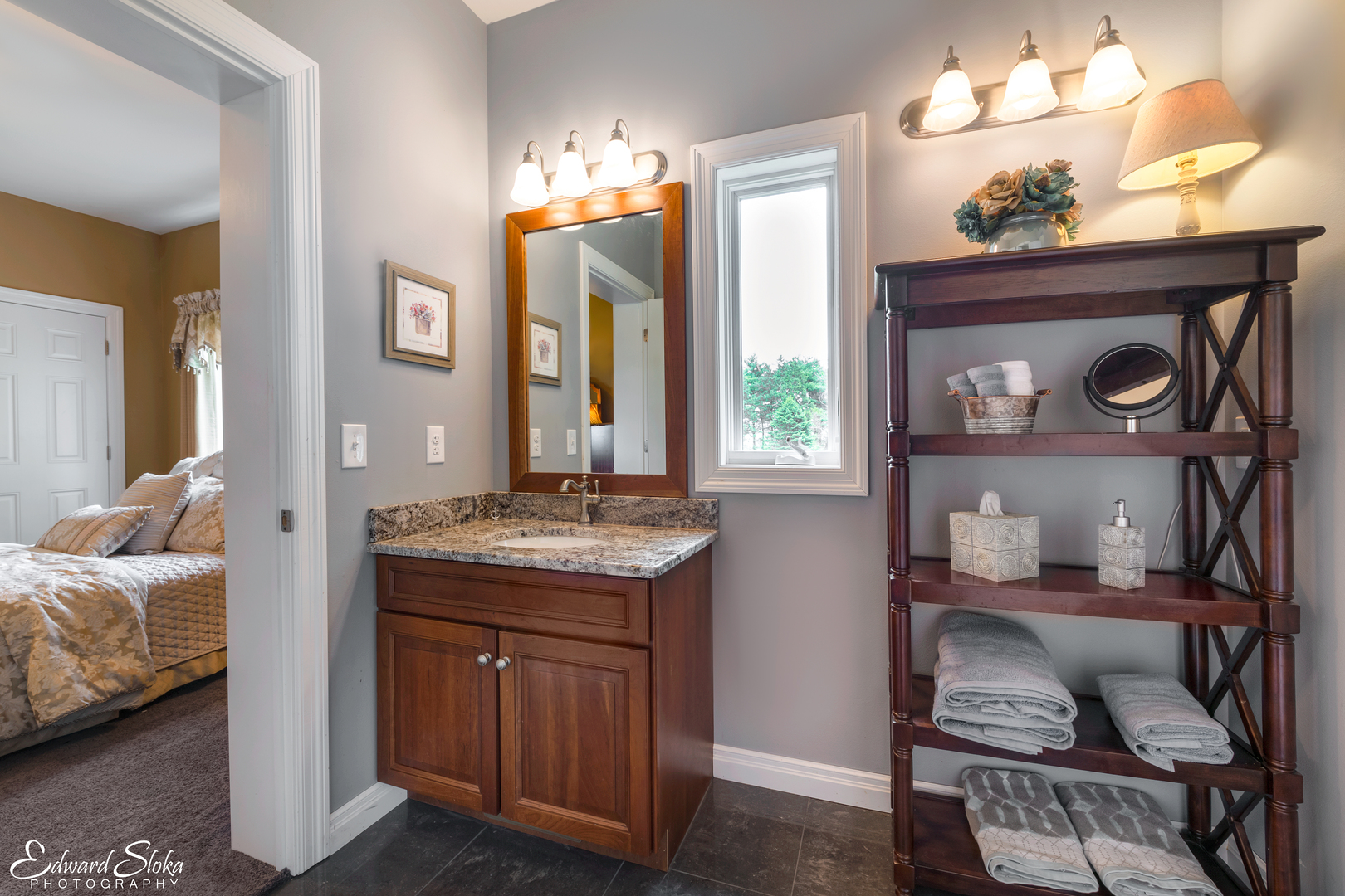 1246 Pinegar Road Garden Prairie, IL 61038 - Photo 32 of 43 a en suite bathroom with a sink and a mirror