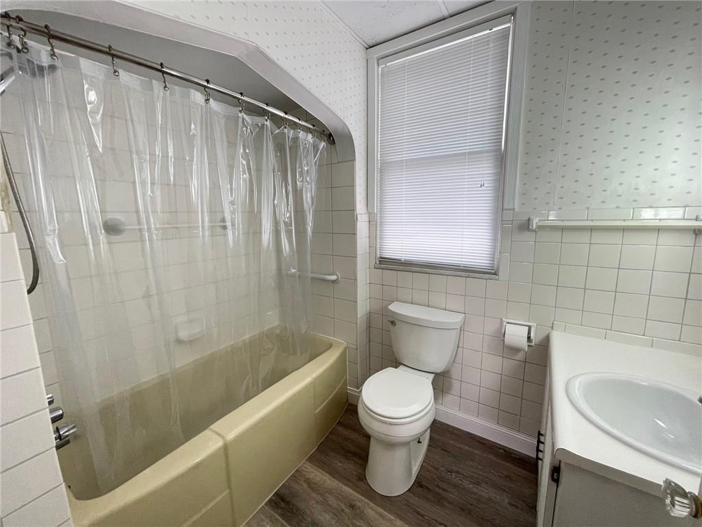 2209 Hawthorne Avenue Pittsburgh, PA 15218 - Photo 14 of 21 a bathroom with a toilet and shower