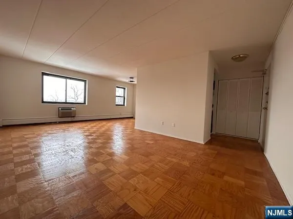 an empty room with windows