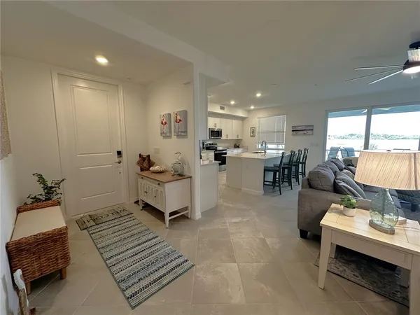 a living room with furniture and a table