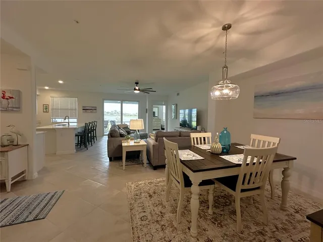 a outdoor space with furniture a window and stainless steel appliances