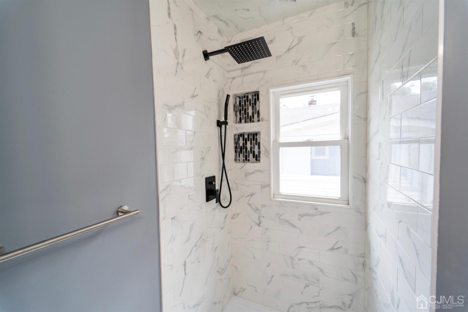 15 Middlesex Avenue Old Bridge, NJ 07735 - Photo 13 of 30 a bathroom with a shower