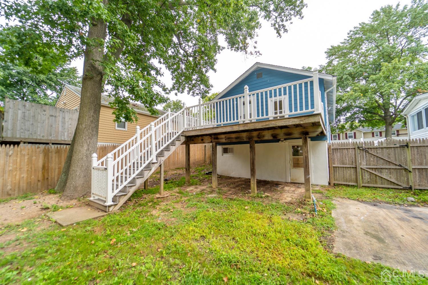 15 Middlesex Avenue Old Bridge, NJ 07735 - Photo 28 of 30 a view of a house with wooden fence