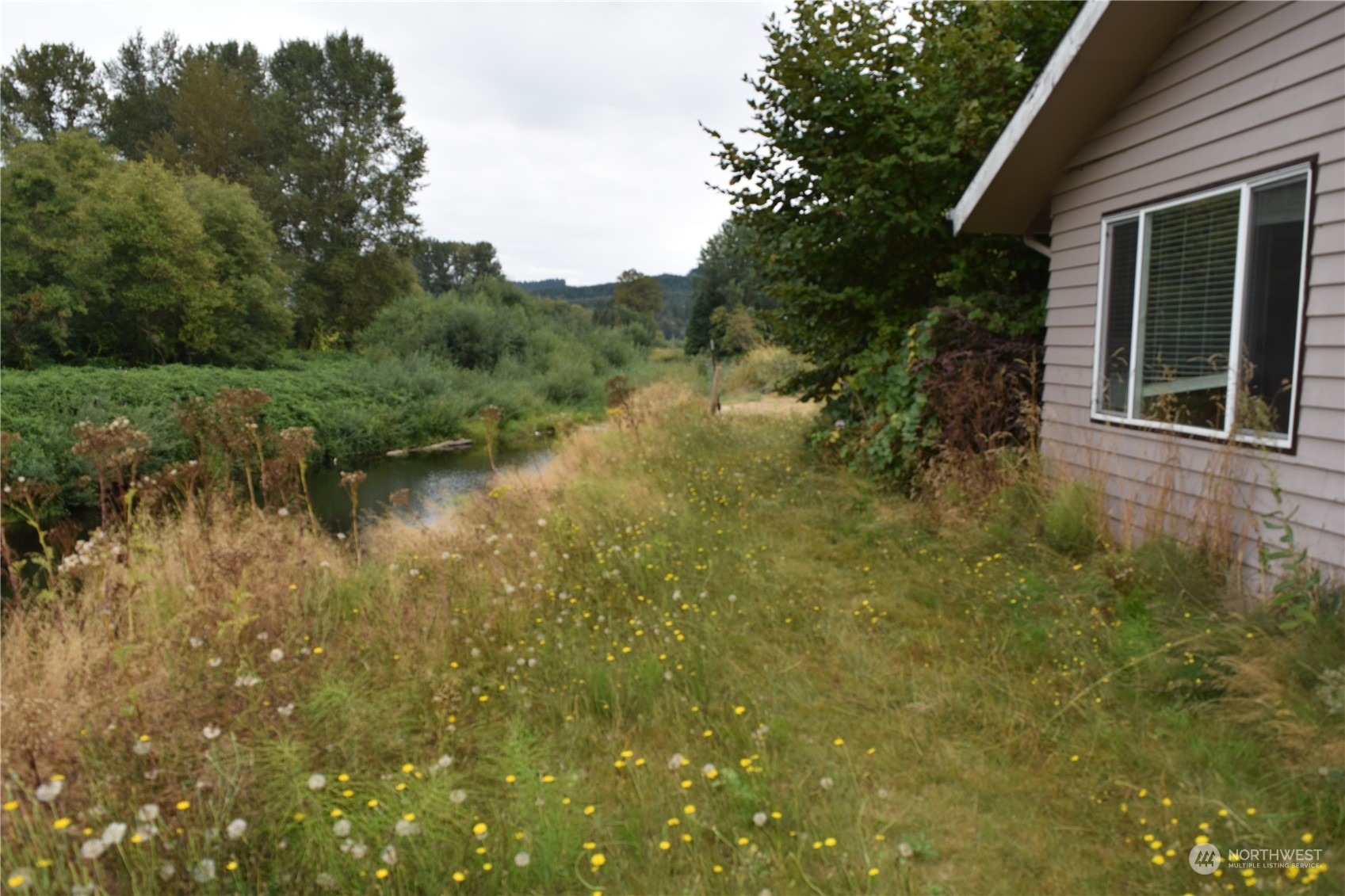 166 Ceres Hill Road Chehalis, WA 98532 - Photo 4 of 33 a view of a house with a lake view