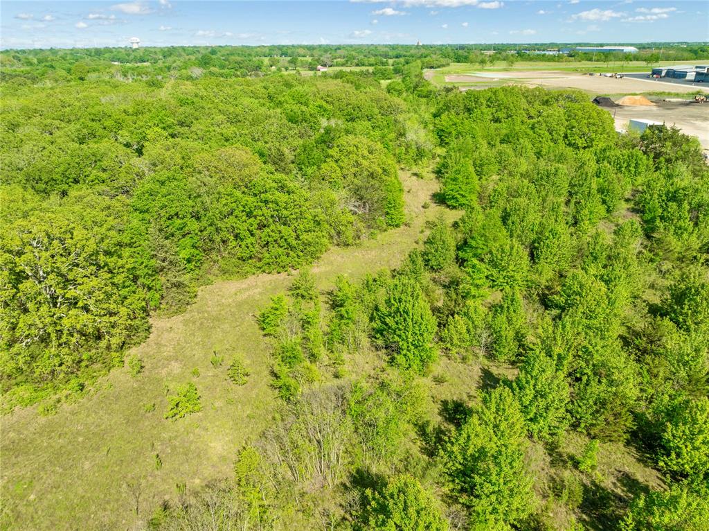 286 Northeast Loop 286 Paris, TX 75460 - Photo 10 of 17 a view of a field with an outdoor space