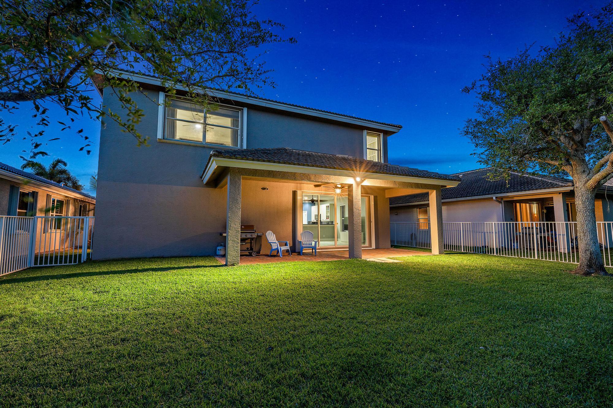 1160 Southeast Kirk Street Stuart, FL 34997 - Photo 32 of 42 Twilight Backyard