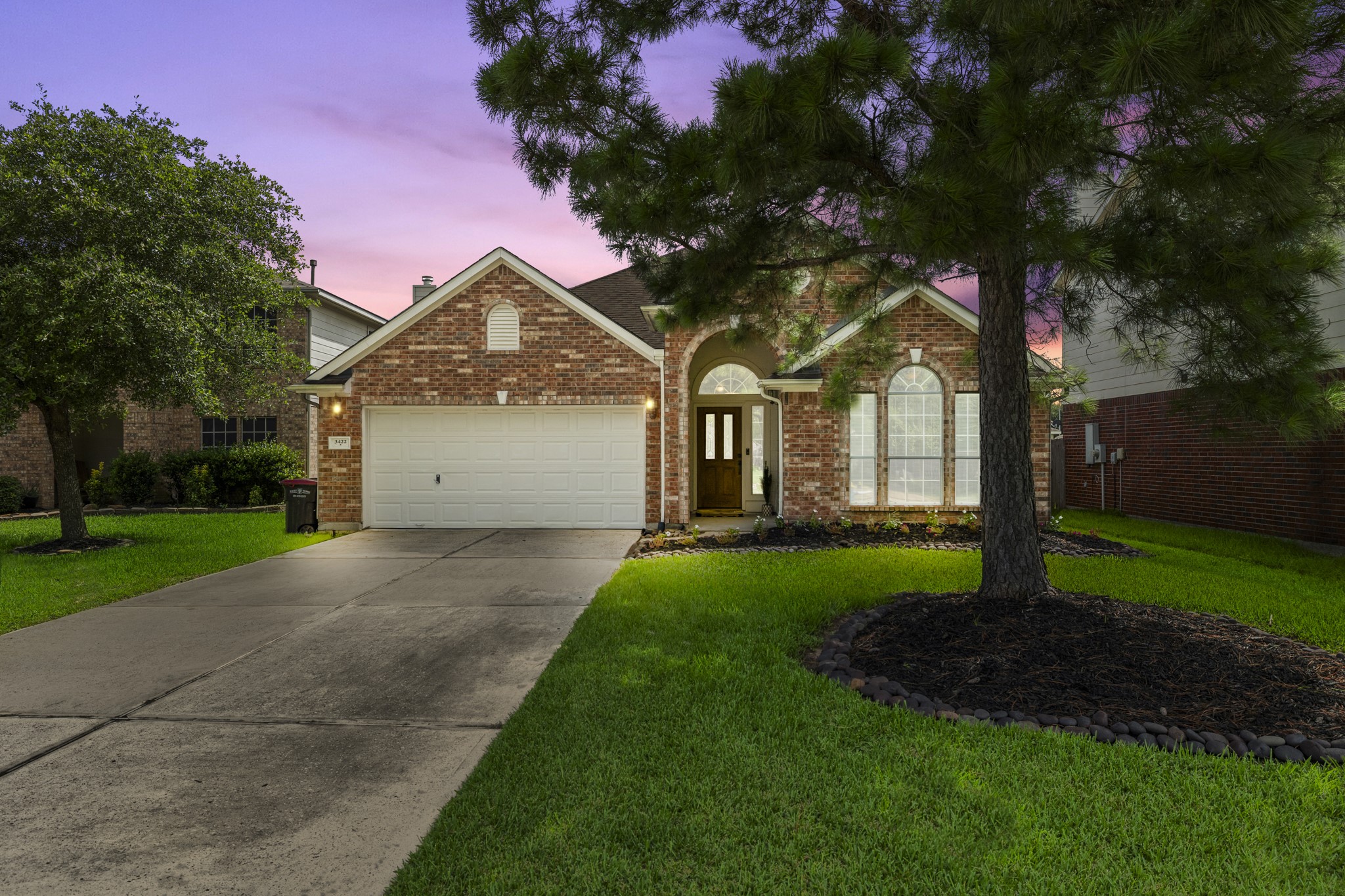 3422 Falcon Trail Court Spring, TX 77373 - Photo 35 of 35 a front view of a house with a yard and garage