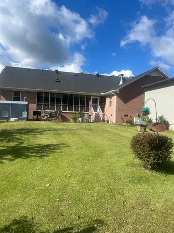 a view of a house with a big yard