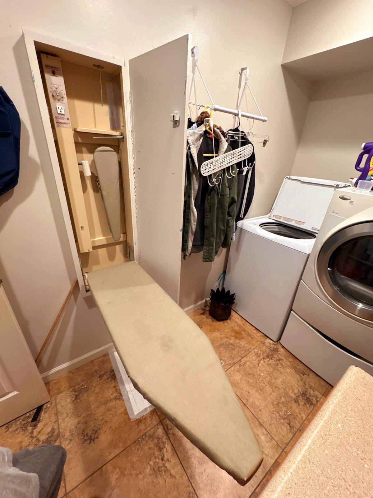 485 Robin Hood Loop Savannah, TN 38372 - Photo 26 of 40 a utility room with dryer and washer