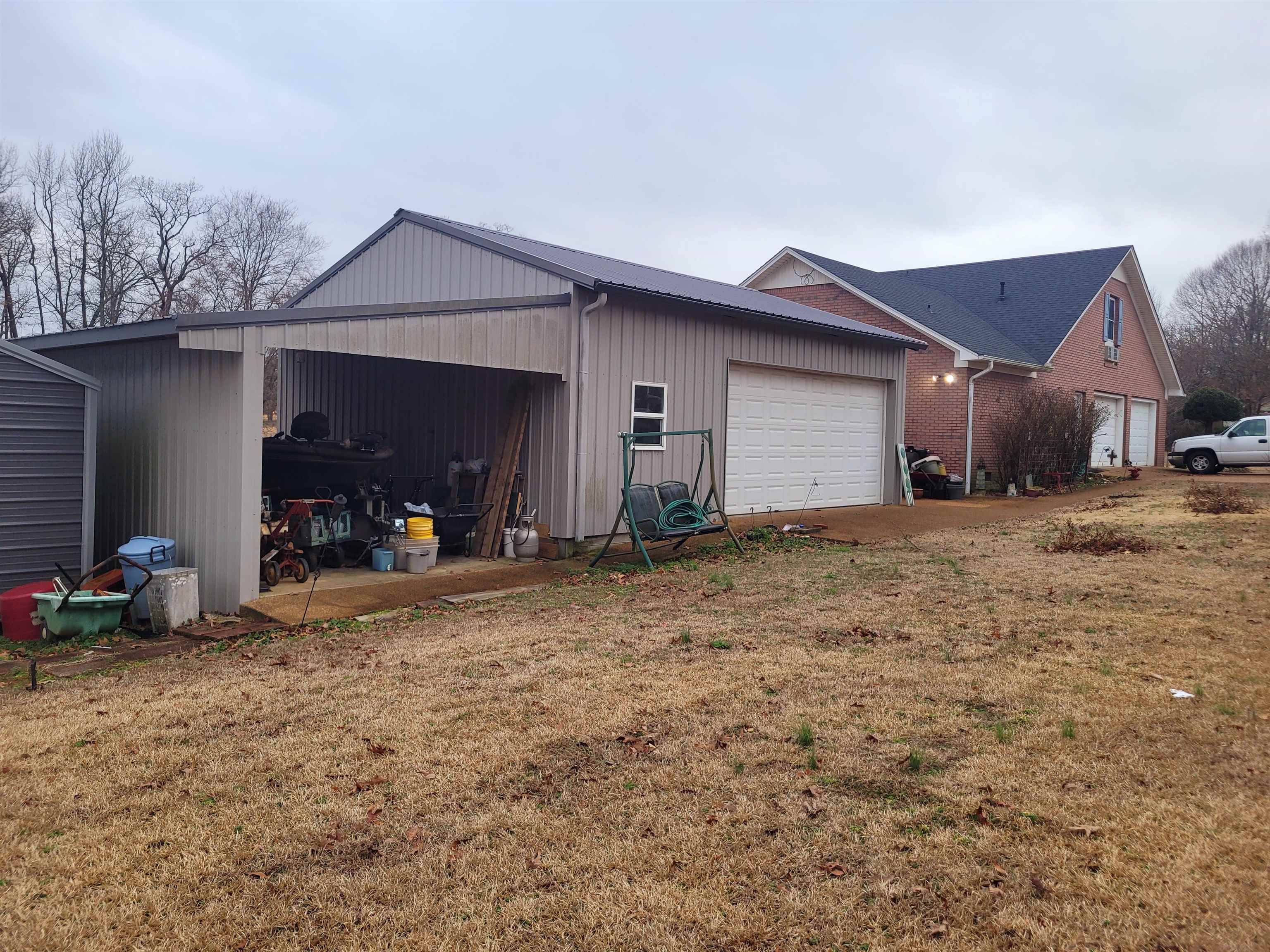 485 Robin Hood Loop Savannah, TN 38372 - Photo 30 of 40 a view of a house with backyard