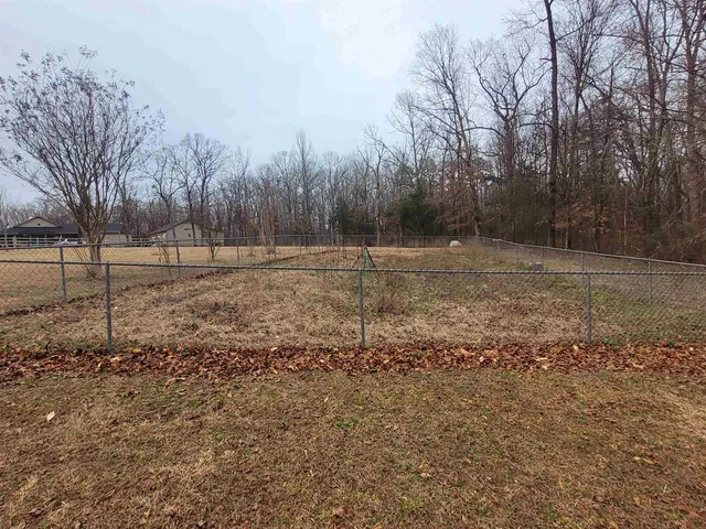 a room with two chairs and couch