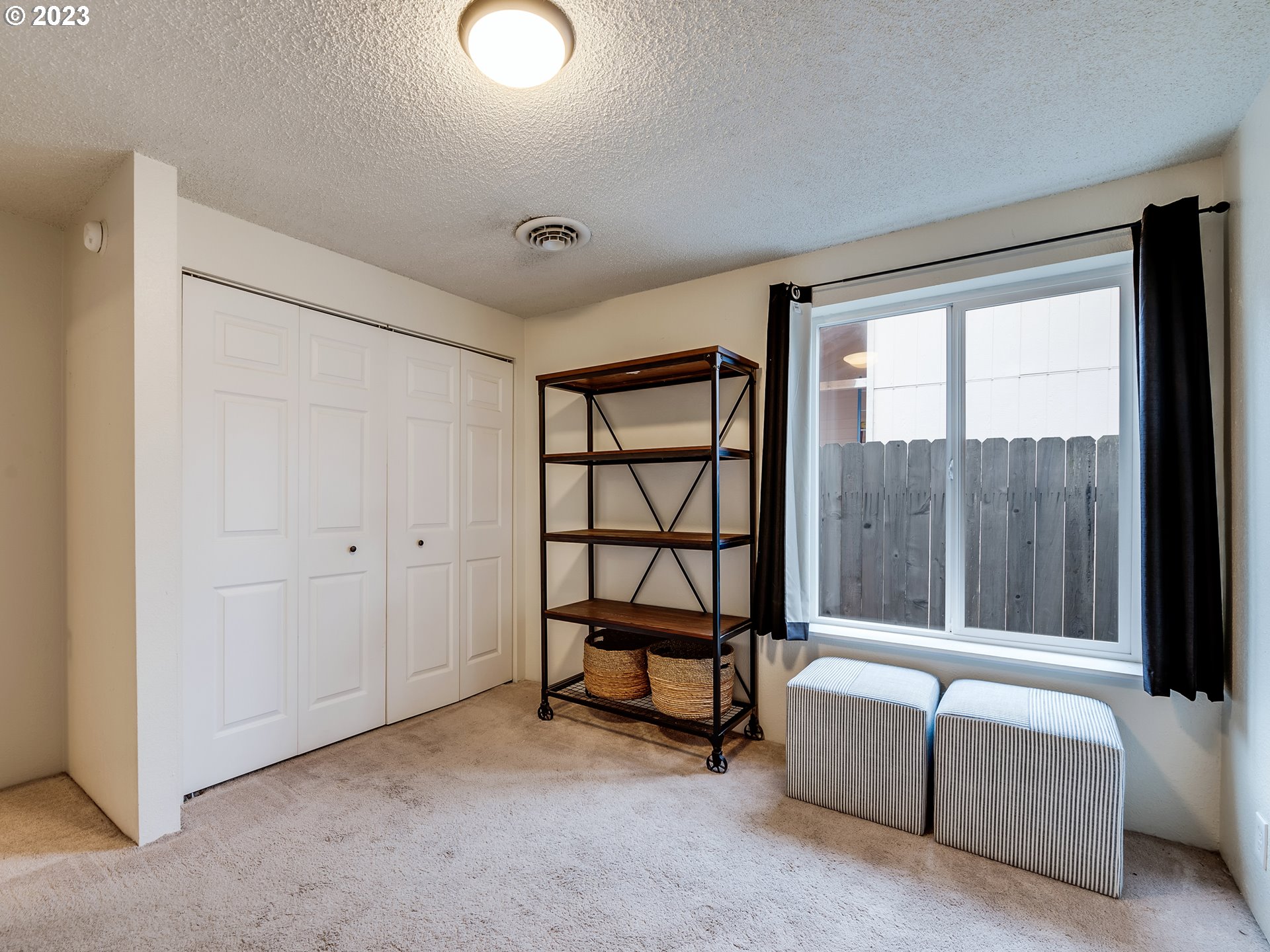 277 South 70th Place Springfield, OR 97478 - Photo 18 of 26 a view of a livingroom with furniture and a window