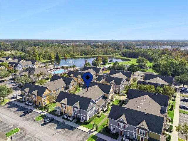 an aerial view of a city with lots of residential buildings