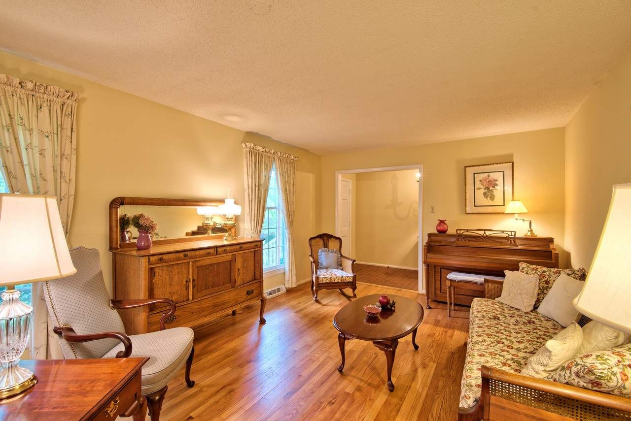 3607 Cole Mill Road Durham, NC 27712 - Photo 5 of 25 The spacious Living Room is currently used as a formal area. How would you use the space? Living Room