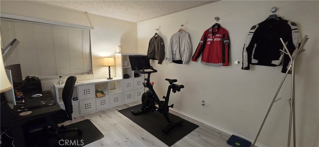 6830 Astoria Drive Riverside, CA 92503 - Photo 23 of 23 a view of walk in closet with clothes and shoes