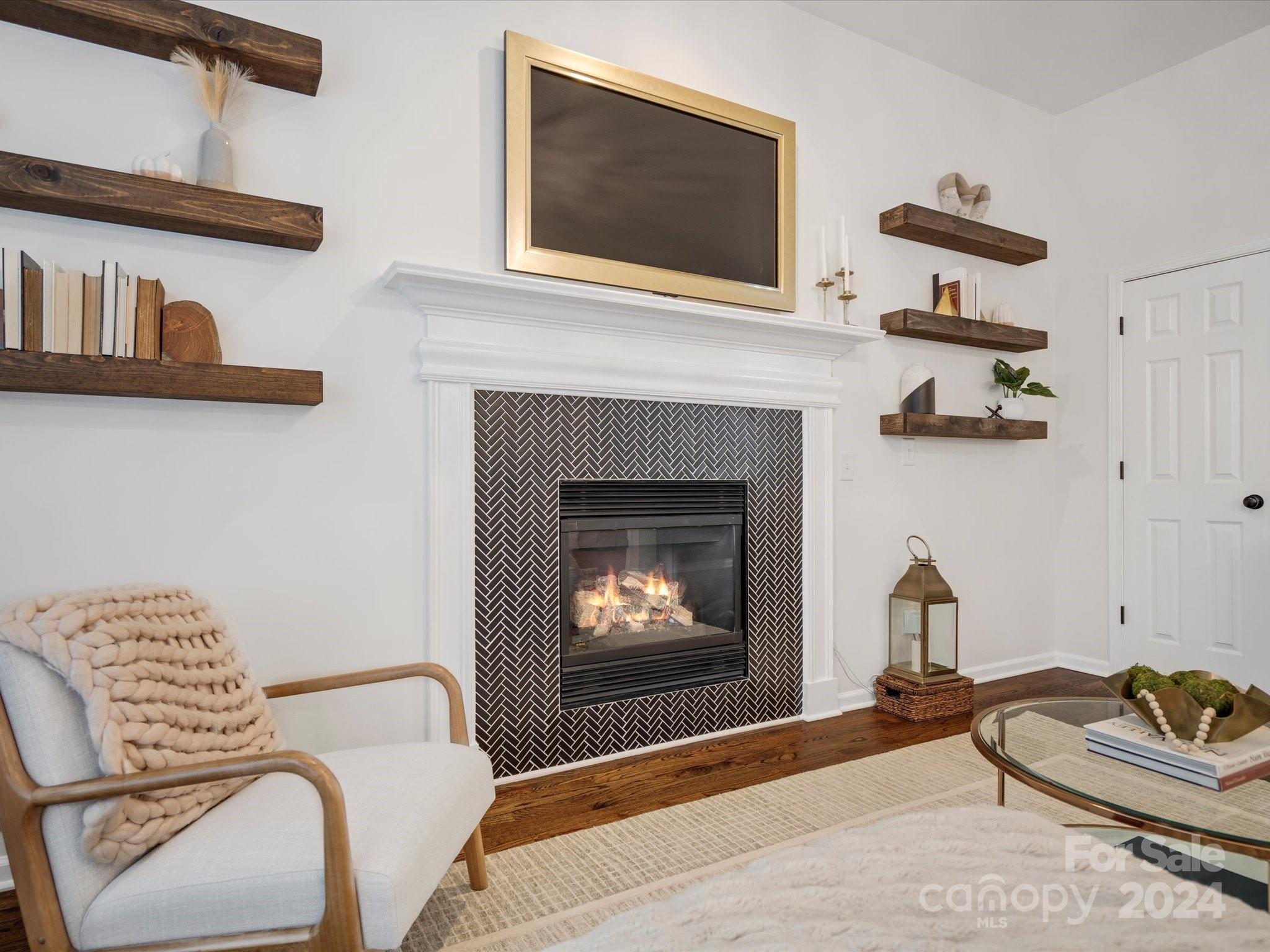 432 Third Baxter Street Fort Mill, SC 29708 - Photo 17 of 48 a living room with furniture and a fireplace