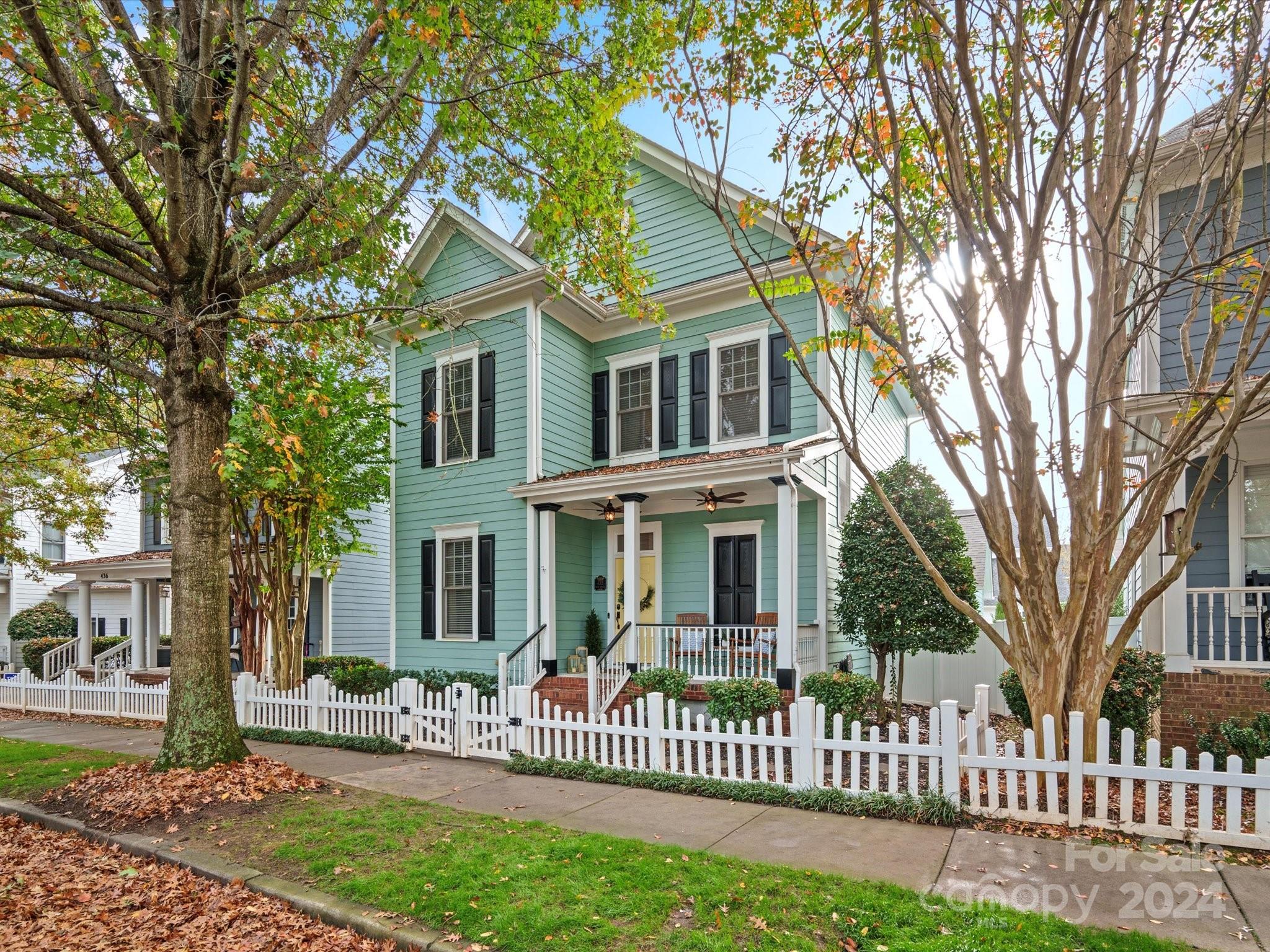 432 Third Baxter Street Fort Mill, SC 29708 - Photo 4 of 48 a front view of a house with a garden