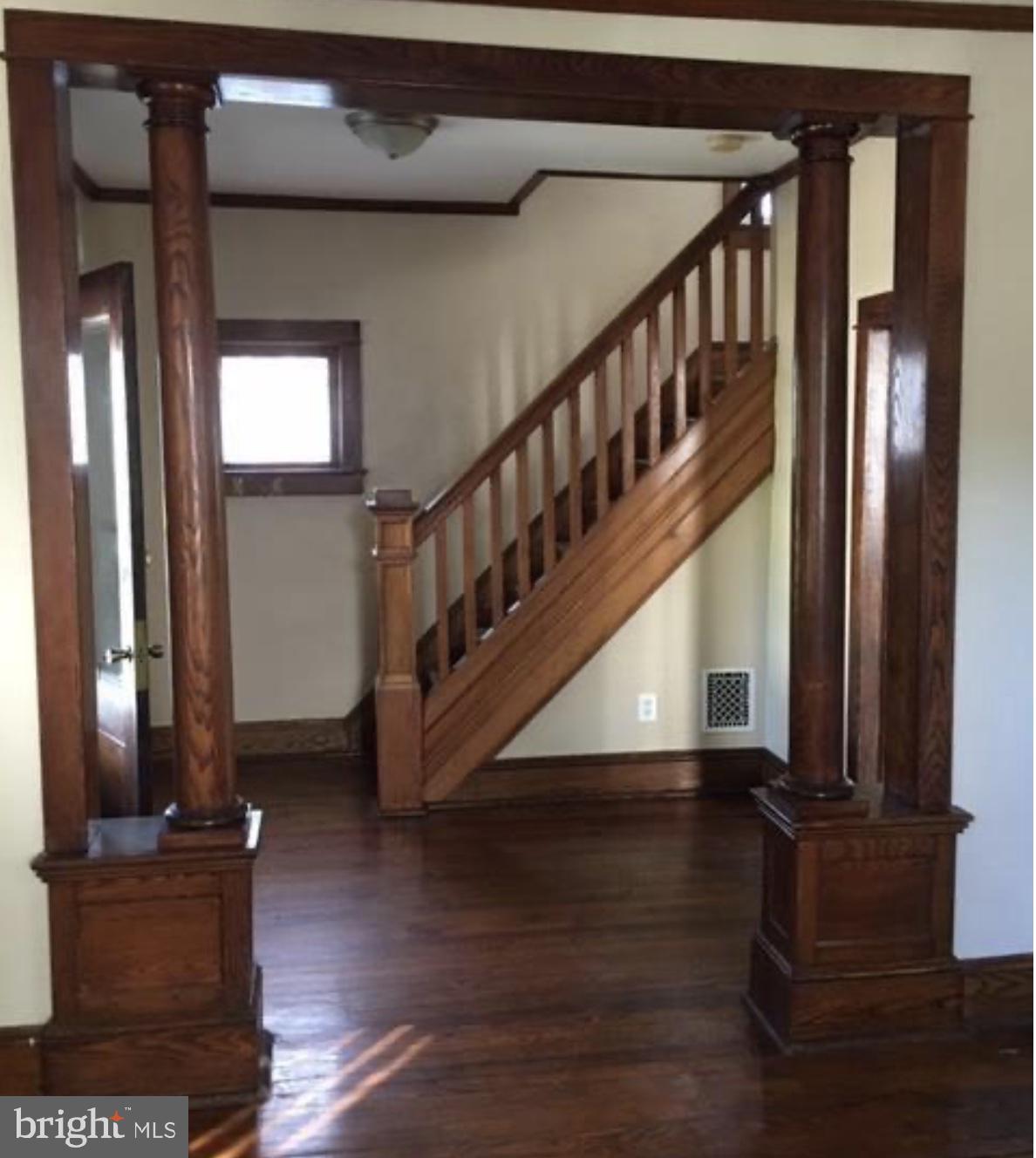 218 Chestnut Street Audubon, NJ 08106 - Photo 2 of 11 a view of entryway and hall with wooden floor