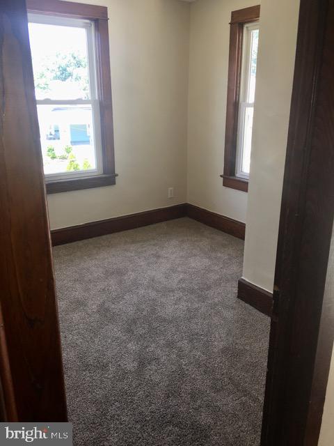 218 Chestnut Street Audubon, NJ 08106 - Photo 8 of 11 an empty room with a window