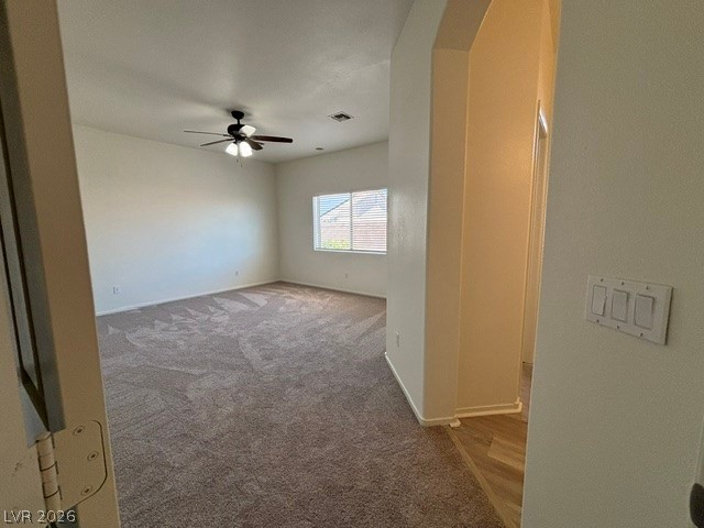 2866 Shimmering Bay Street Laughlin, NV 89029 - Photo 19 of 32 A spacious room offers comfortable carpeted flooring and abundant natural illumination.