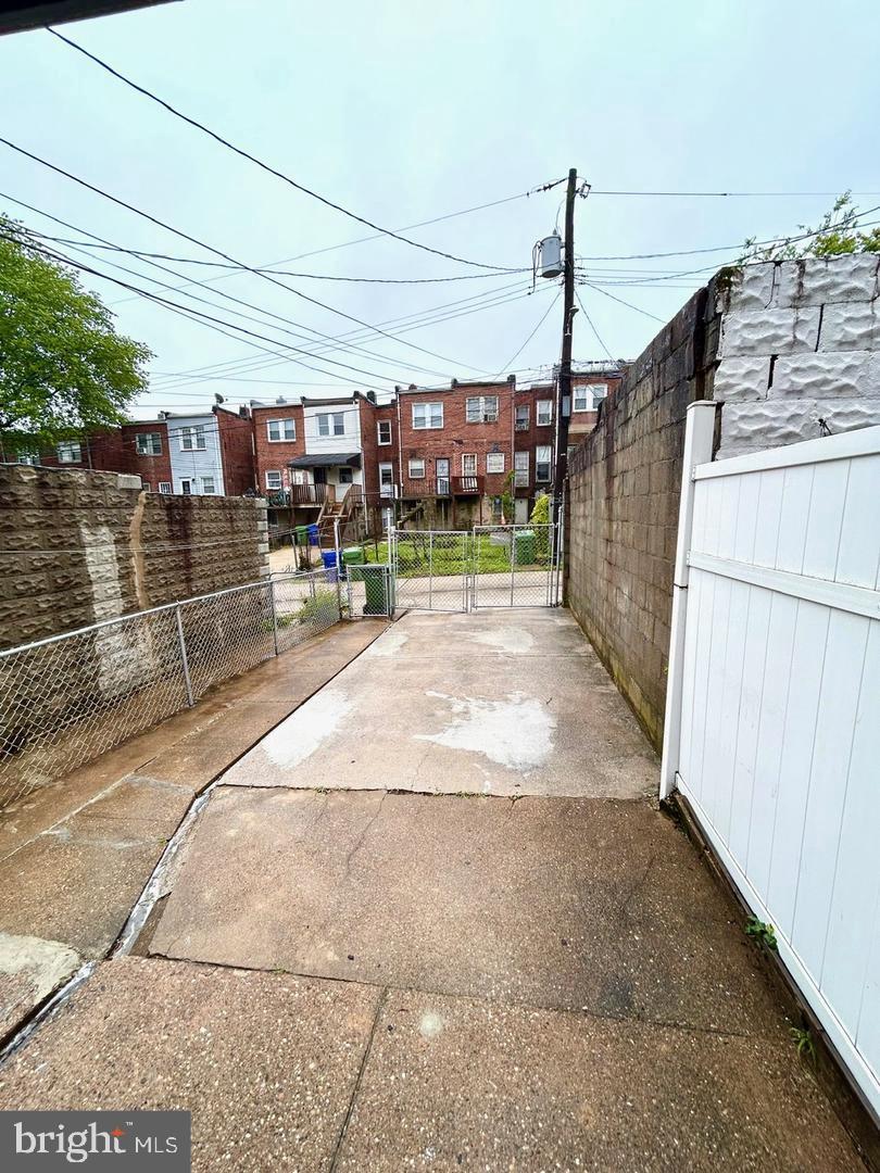 3925 Colborne Road Baltimore, MD 21229 - Photo 12 of 13 a view of a houses with a street