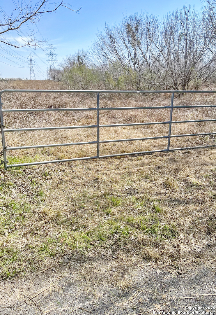 P-9 C Quesenberry Road Von Ormy, TX 78073 - Photo 3 of 3 a view of empty space with wooden fence