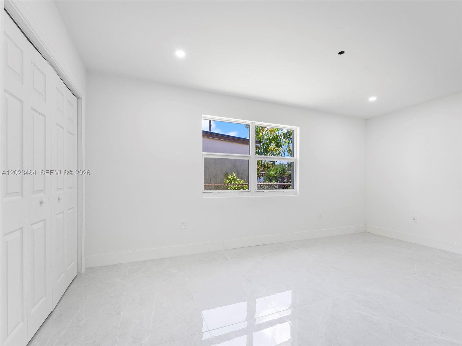 1961 Rutland Street Opa-Locka, FL 33054 - Photo 17 of 33 an empty room with windows