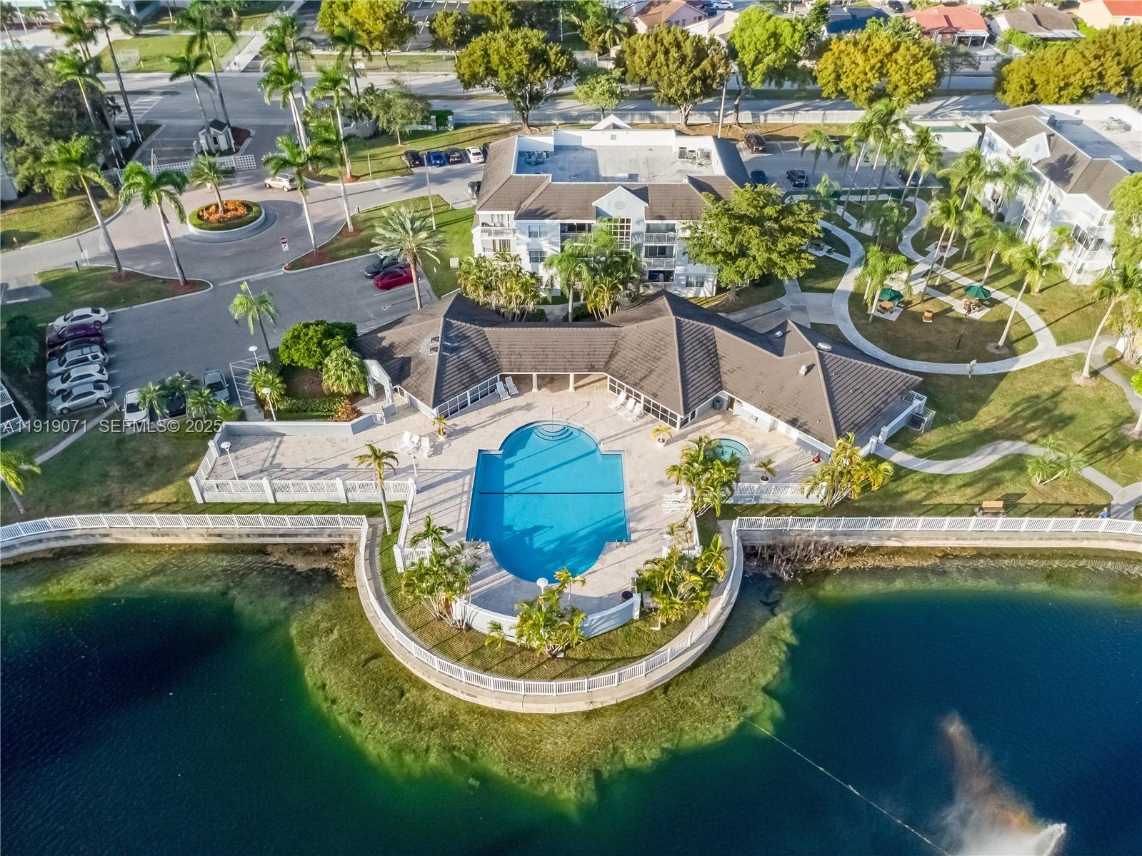 8560 Southwest 212th Street, Unit 308 Cutler Bay, FL 33189 - Photo 15 of 26 a view of a swimming pool with outdoor seating