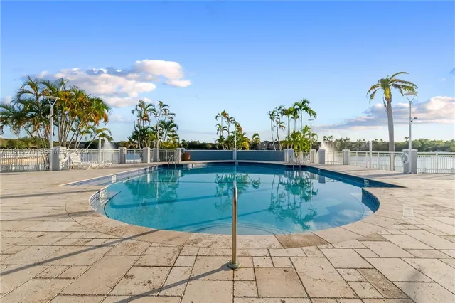 a view of a swimming pool with a terrace