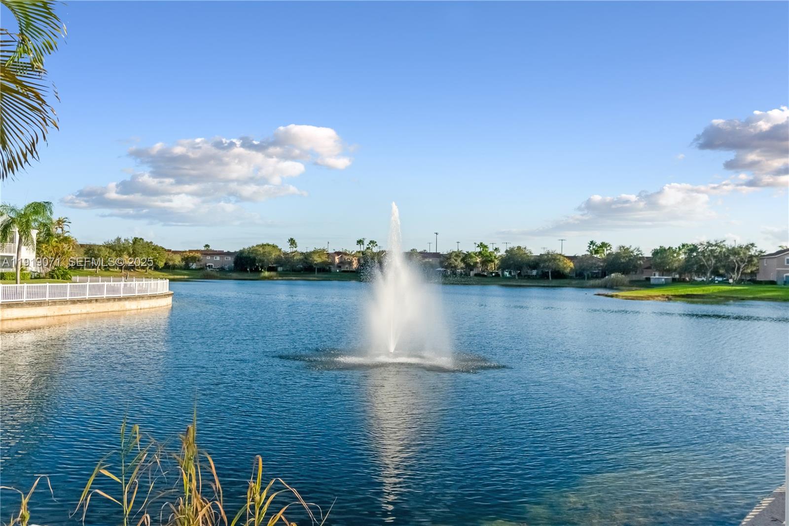 8560 Southwest 212th Street, Unit 308 Cutler Bay, FL 33189 - Photo 19 of 26 a view of lake