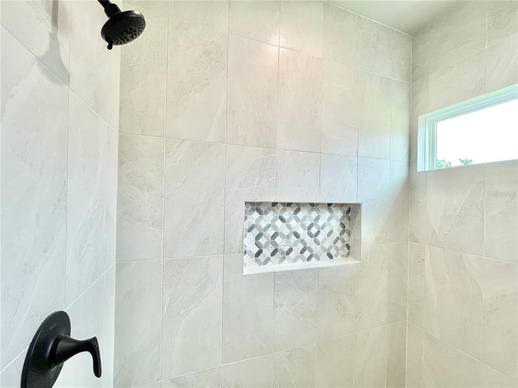 1021 Southwest 67th Street Gainesville, FL 32607 - Photo 21 of 53 a close view of a shower curtain