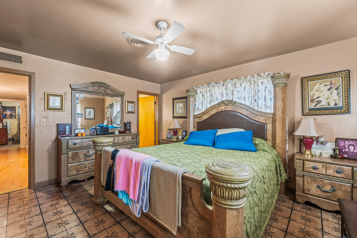 2513 52nd Street Lubbock, TX 79413 - Photo 20 of 29 a kitchen with a stove a sink and a chandelier
