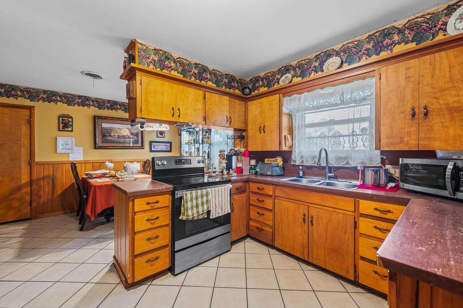 2513 52nd Street Lubbock, TX 79413 - Photo 10 of 29 a very nice looking kitchen with a large window