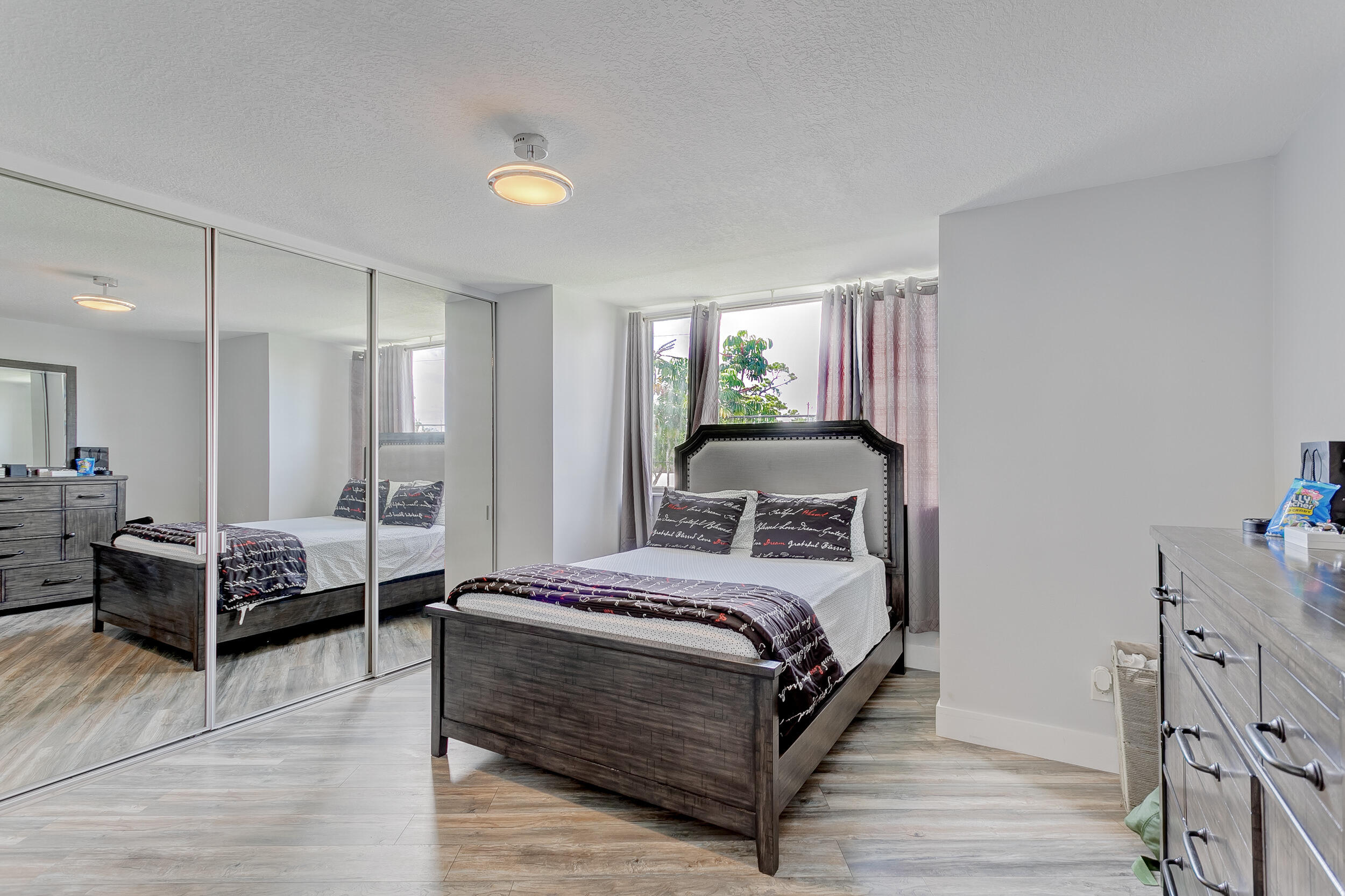 5050 Elmhurst Road, Unit D West Palm Beach, FL 33417 - Photo 18 of 28 Master Bedroom