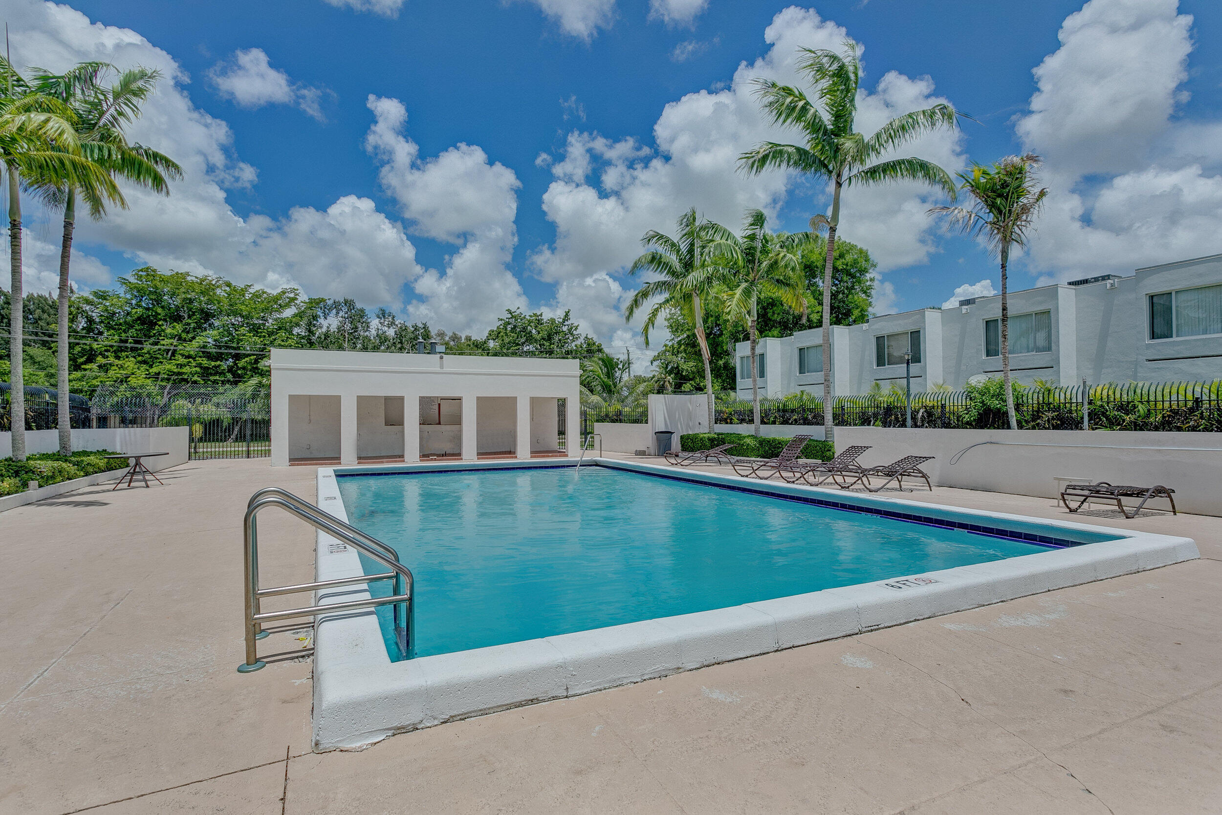5050 Elmhurst Road, Unit D West Palm Beach, FL 33417 - Photo 22 of 28 Community Pool