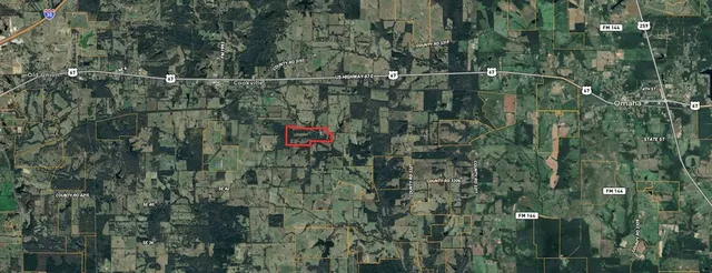 a view of city and green space