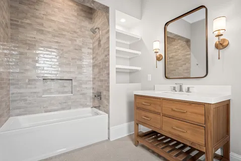 a bathroom with a bathtub and a sink