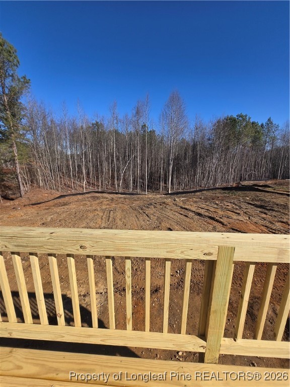 307 One Tree Hill Sanford, NC 27330 - Photo 11 of 15 a view of a yard with wooden fence