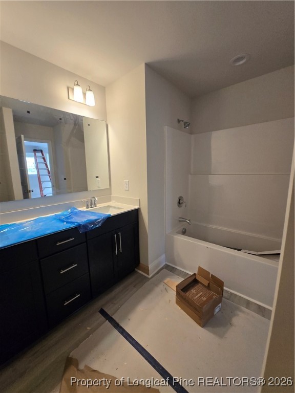 307 One Tree Hill Sanford, NC 27330 - Photo 8 of 15 a bathroom with a tub sink and a mirror