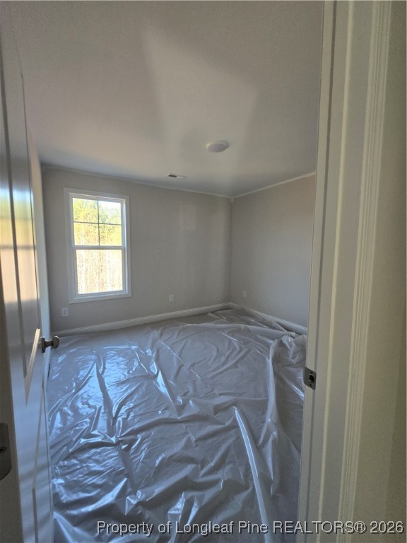 307 One Tree Hill Sanford, NC 27330 - Photo 9 of 15 a view of an empty room and window