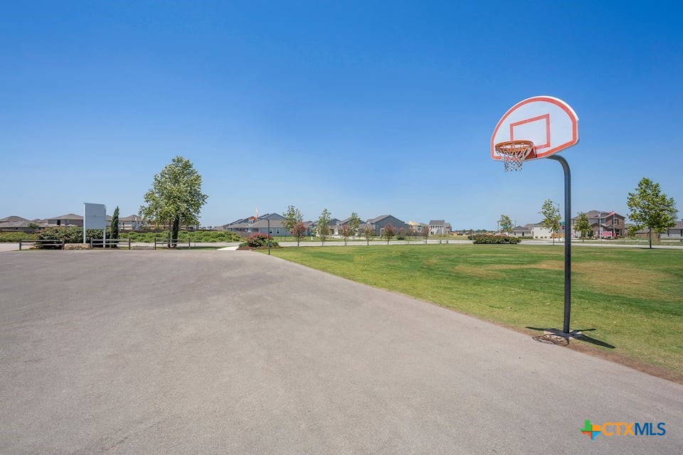 224 Escape Way Jarrell, TX 76537 - Photo 8 of 9 a view of a lake with a yard