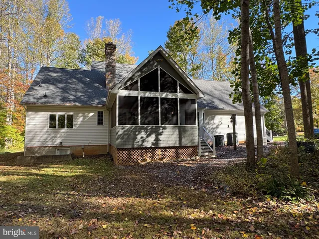 a view of road with large trees