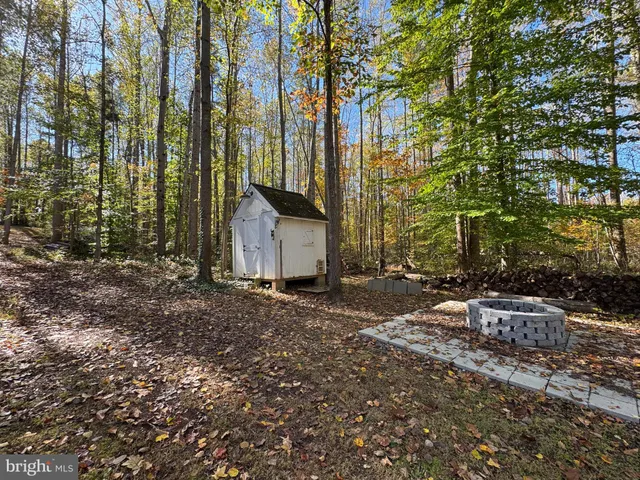 a view of yard covered with snow